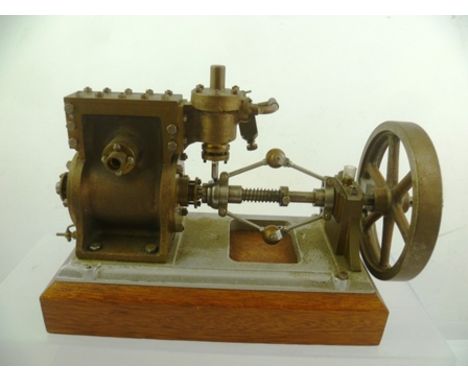 A HORIZONTALLY MOUNTED SPRING LOADED STEAM ENGINE GOVERNOR with later aluminium base and hardwood plinth, 28cm wide overall 