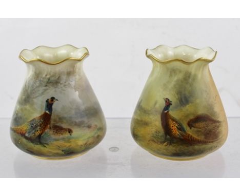TWO ROYAL WORCESTER PORCELAIN POSY VASES, hand painted with pheasants by James Stinton, the one vase with blush ivory ground,