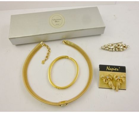 CHRISTIAN DIOR A DIAMANTE AND GILT METAL FLEXIBLE COLLAR, a Napier diamante BANGLE and a pair of EARRINGS, and another diaman