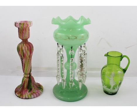 A MARY GREGORY TYPE GREEN GLASS JUG, with cameo child decoration, 13.5cm, together with a green glass LUSTRE and a multi-glas