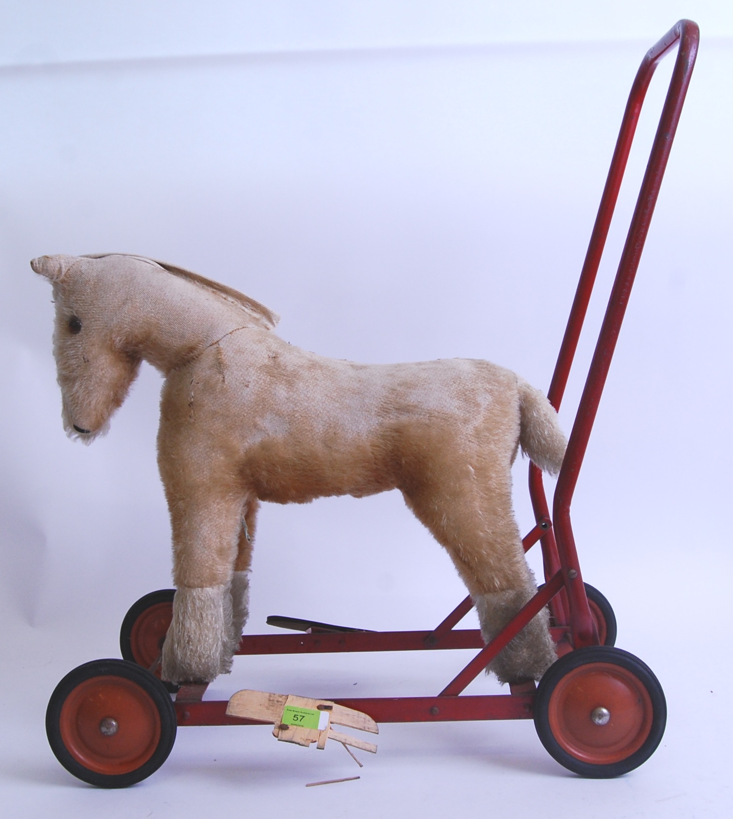 CHILTERN HORSE A vintage Chiltern made push along ride on stuffed toy