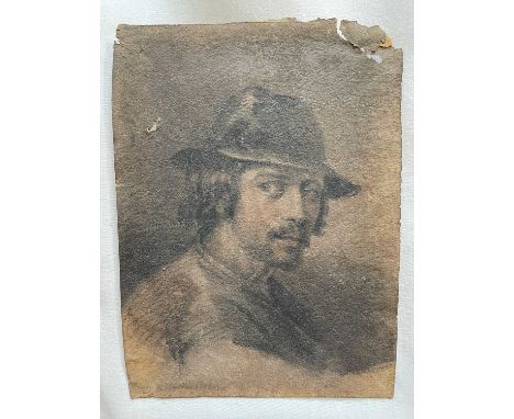 Continental School, 19th century, pencil and charcoal portrait of a man, 14cm x 10.5cm, in glazed frame
