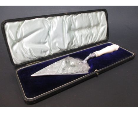 A silver presentation trowel dated 1902, James Deakin & Sons, Sheffield 1902, with ivory handle, in presentation case  