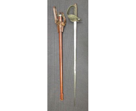 A George VI officers dress sword, with etched blade and leather scabbard