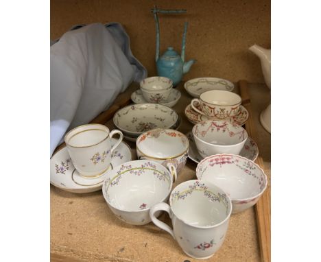 A collection of 18th century porcelain tea bowls and saucers, tea cups and saucers, turquoise tea pot etc  