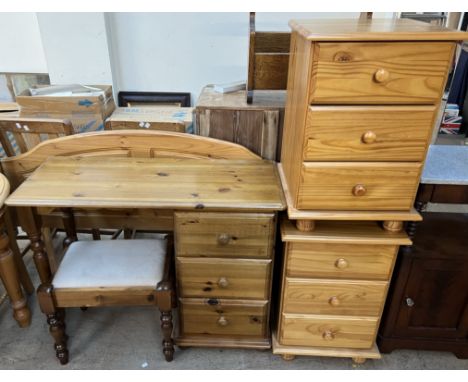 A pine dressing table together with a dressing table stool, easel mirror, pine head board and a pair of pine bedside chests 