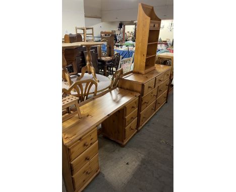 A pine desk, with a rectangular top above two banks of three drawers together with a large pine chest of drawers, a pine book