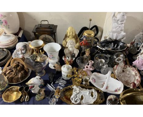 A modern mantle clock together with pottery masks, clown lamp, miniature skeleton clock, Royal Crown Derby Swan paperweight, 