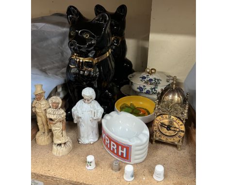 A pair of Staffordshire pottery cats together with pottery figures, brass clock, Poole pottery dish etc 
