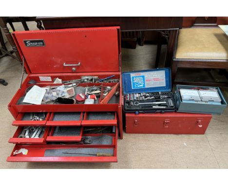 A Snap-on tool station with a hinged lid, and drawers together with a Snap-on tool box, a ratchet set, a Wilson Amperes and v