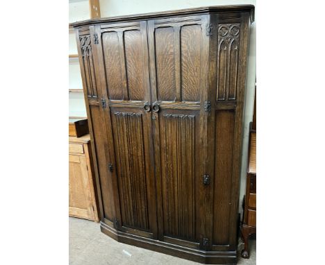 A 19th century mahogany linen press, with a moulded cornice above a pair of panelled cupboard doors, the base with three long