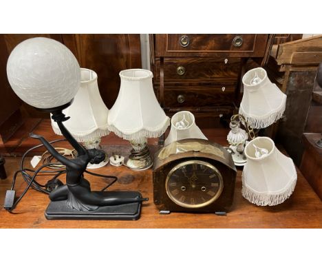 An Art Deco style table lamp together with a chandelier, matching table lamps and a mantle clock