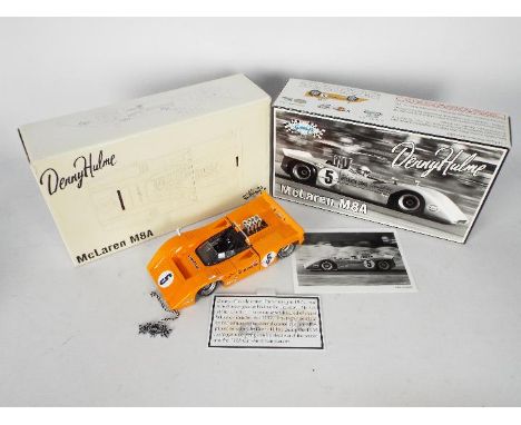 GMP - A boxed Limited Edition GMP 1:18 scale #12022 Denny Hulme McLaren M8A. The highly detailed diecast appears to be in Min