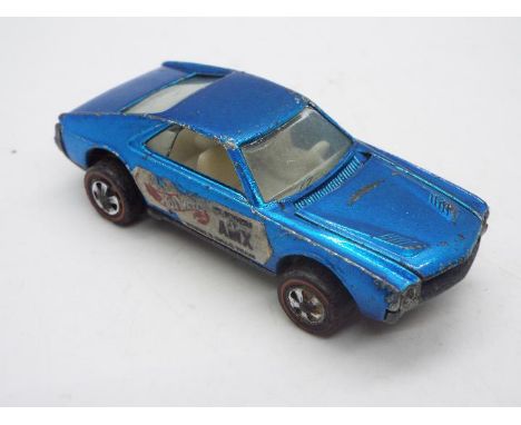 Hot Wheels - Redline - A rare UK only Ed Shaver Custom AMX in Blue. The car shows signs of play wear and has some damage wher