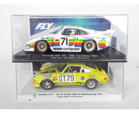 Fly - Two boxed 1:32 scale slot cars from Fly. Lot consists of #99081 H&amp;T Motor Racing Limited Edition Porsche 911S 1000K