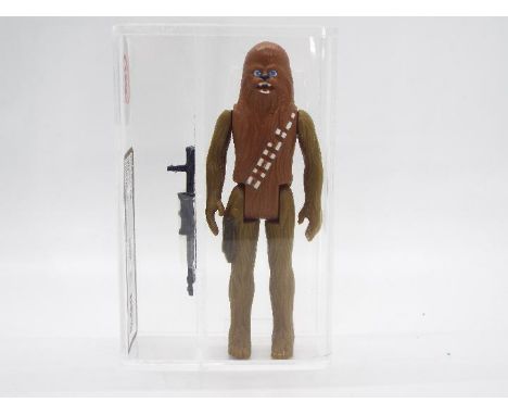 Star Wars - A loose vintage and graded Star Wars 3 3/4 action figure 'Chewbacca'. The figure is UK Graded at 85% overall, wit