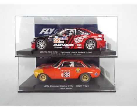 Fly - Two boxed 1:32 scale slot cars from Fly. Lot consists of #88312 Alfa Romeo Giulia GTAJ DRM 1972 'Rainer Maschke'; toget