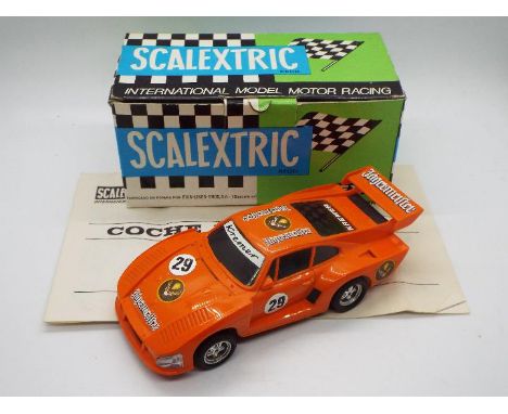 Scalextric Exin (Spain) - A boxed Scalextric Exin #4067 Porsche 935. The model in orange , comes with instructions, and appea