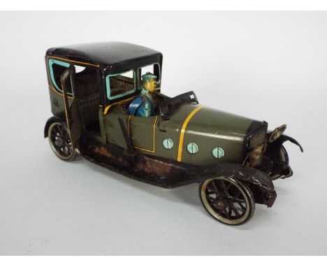 Paya - A vintage original tin plate Paya Limousine with driver. It is 17 cm in length and has opening doors, pull back spring