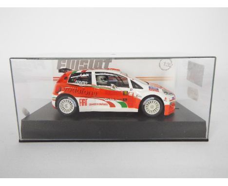 FlySlot - Slot Car model in 1:32 Scale - # M04102 Punto Rally De Portugal 2008. Appears mint in presentation case.(This descr