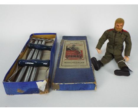 Palitoy - A vintage Blonde flock hair bearded Action Man figure with hard hands in military uniform. He shows signs of play u
