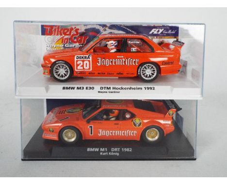 Fly - Two boxed 1:32 scale slot cars from Fly. Lot consists of #88269 BMW M1 DRT 1982 ' Kurt Konig'; together with #99067 'Bi