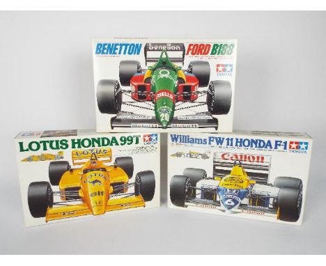 Tamiya - Three boxed 1:20 scale plastic model F1 racing car kits from the Tamiya 'Grand Prix Collection'. Lot consists of Tam