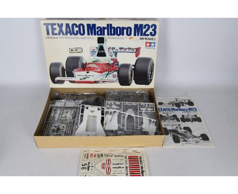 Tamiya - A vintage boxed Tamiya BS1216 Texaco Marlboro McLaren M23 1:12 'Big Scale' plastic model kit. The kit appears to be 