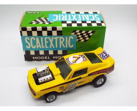 Scalextric Exin (Spain) - A boxed Scalextric Exin #4049 Ford Mustang 'Dragster'. The model in yellow appears to be in Excelle