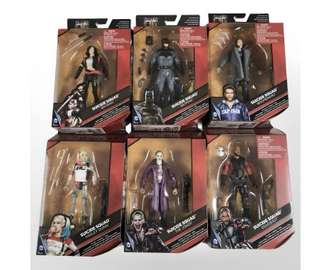Six Mattel DC Comics multiverse figurines in boxes.