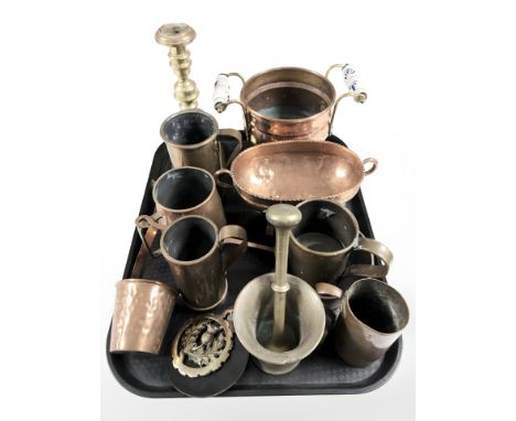 Copper tankards and pots, brass candlestick, pestle and mortar, horse brass, etc.