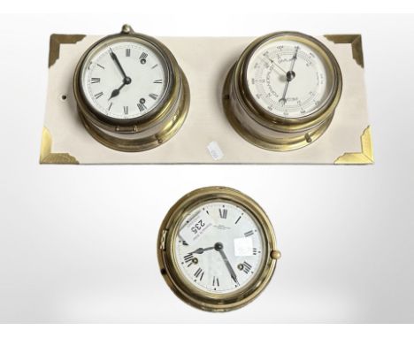 A ships style brass cased timepiece and barometer mounted on board, and a further timepiece signed Wempe, Hamburg.