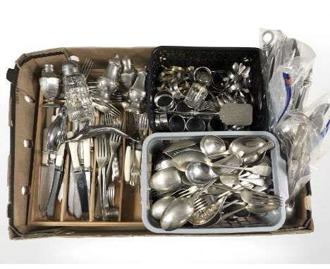 A quantity of loose stainless steel and plated cutlery, sifters, napkin rings, novelty penguin corkscrew etc 
