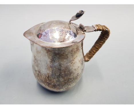 Ksia Keswick School of Industrial Art hot water jug by Harold Stabler, silver plated.