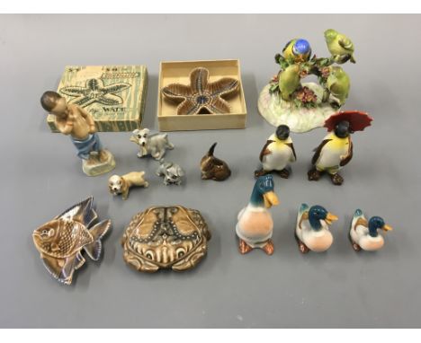 A selection of various ornaments including Wade and whimsies, Royal Worcester Burmah, Royal Adderley birds, Beswick penguins,