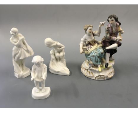 A German figurine group couple with cat and bird, together with three Royal Worcester blank figures.