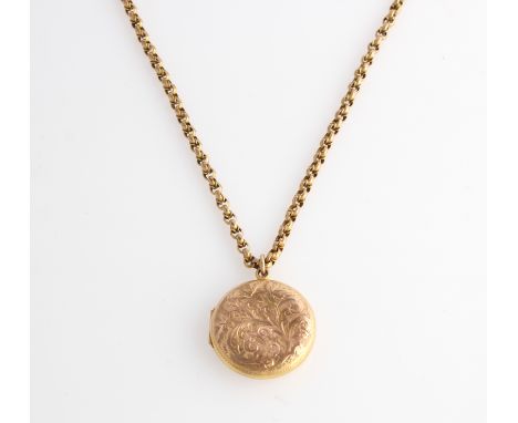 An engraved circular locket, stamped 9 .375, on a belcher link chain.