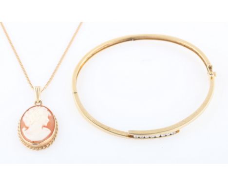 A cross over design bracelet, stamped 375, together with a cameo pendant on hallmarked 9ct yellow gold curb link chain, (2).