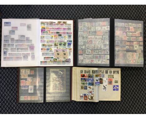 Two commonwealth stamp stock books, one all world stamp stock book &amp; one stamp album.