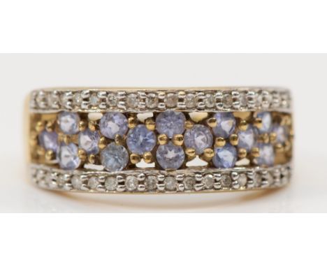 A 9ct gold tanzanite and diamond ring, claw set, K, 2.1g 