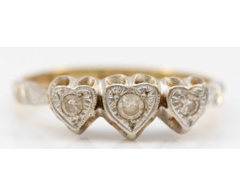 An 18ct gold and platinum three stone ring, K 1/2, 2.8g 