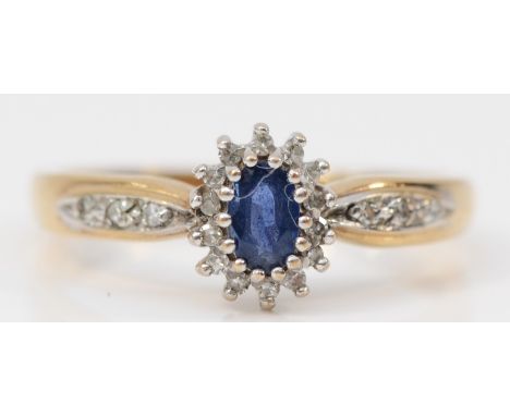 A 9ct gold diamond and sapphire oval cluster ring, N 1/2, 2.5g 