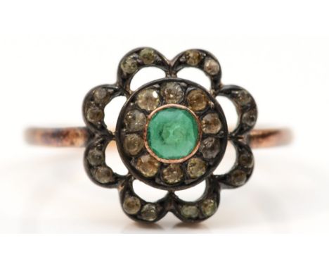 An unmarked vintage 9ct gold and silver set paste cluster ring, O, 2.5gm 