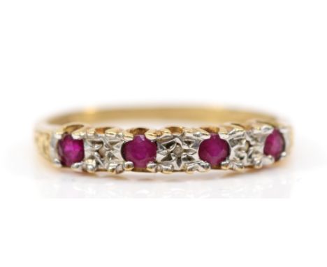 A 9ct gold vintage diamond and ruby seven stone ring, N 1/2, 1.5g 