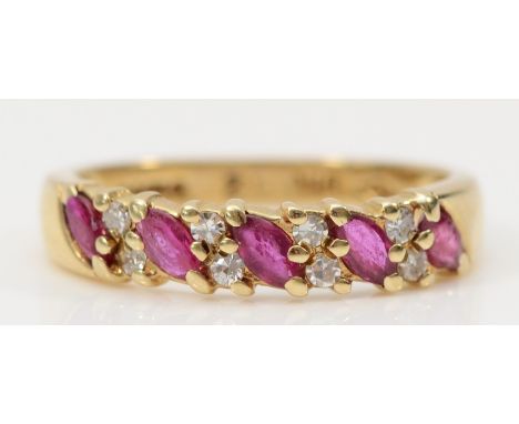 A 9ct gold ruby and diamond half eternity ring, K 1/2, 2.1g 