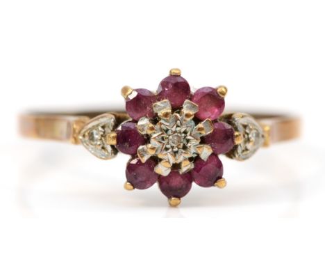 A 9ct gold ruby and diamond cluster ring, Y, 2.4gm 