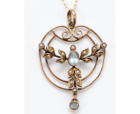 An Edwardian 9ct gold aquamarine and half pearl openwork pendant, 35mm, chain, 3.3gm 