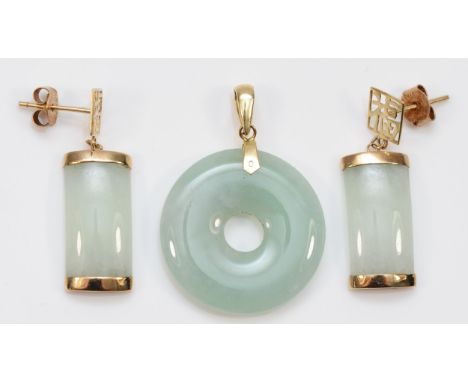 A 9ct gold jade pendant with a pair of 9ct gold jade earrings, pendant is 20mm, earrings are 26mm, 7.2g 