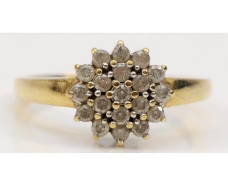 A 9ct gold diamond floral cluster ring, L 1/2, 2.4g 