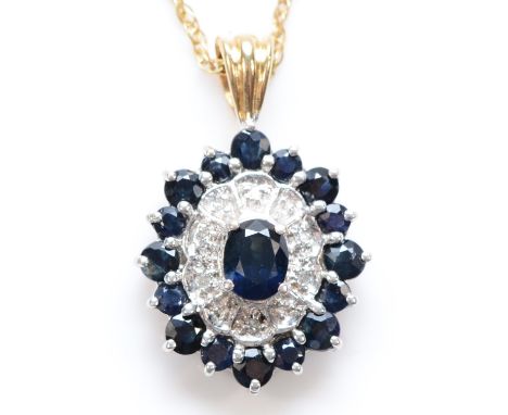 A 9ct gold sapphire and diamond cluster pendant necklace with a claw setting, 15mm pendant, 3g 